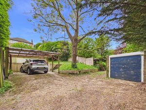 CARPORT, DRIVEWAY & GARAGE- click for photo gallery